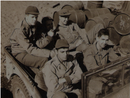 Bill (front passenger) with Group, Adak. 1943