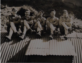 Bill (right) with group on top of Photo Lab