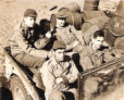 Bill (front passenger) with Group, Adak. 1943