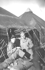 Don Blumenthal & Unknown outside their tent