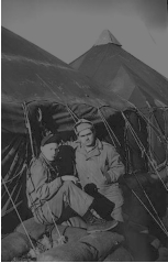 Don Blumenthal & Unknown outside their tent