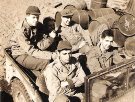 Bill (front passenger) with Group, Adak. 1943