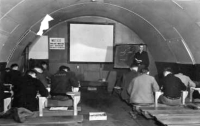 Brodie teaching a religious study class on Attu. [Robert Brodie]