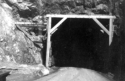 Warehouse tunnel. It goes back into the rock 1/2 mile. Attu, 1945.  {Elbert McBride]