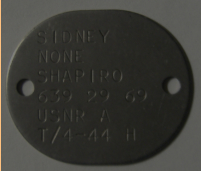 Sidney Shapiro's Dog Tag, Found On Attu, 2008. [Robert Coyle]