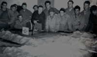 Studying Attu terrain mockups prior to the landings. [The Capture of Attu, pg. 107]