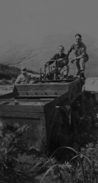 George Brown of WV and Hughes on Japanese Compactor used to make their airstrip. [Robert Brodie]