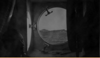 Adak, Dec 1942/43, as viewed through transport port hole. [Mack Collings]