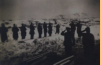 These were two soldiers that were caught in an avalanche at Attu. They were being buried at Little Falls Cemetery at Massacre Bay.  [Vince Kotouch]