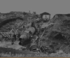 Landing forces discover Japanese midget submarines on a marine railway. May 1943.  [George Villasenor]