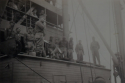 Pre-disembarkation pep talk by commander(s) aboard the transport ship prior to troops landing on Attu at Massacre Bay.  [Ed Nielsen]