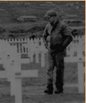 This is the person seen in the background of picture #13 visiting the graves at Little Falls Cemetery, Attu, AK, 1945.  [Elbert McBride]