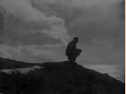 Cloud formations surround Attu, 1945.  [Elbert McBride]