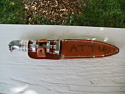 Bill’s handicrafts from Attu memorabilia: a modified ka-bar knife, with Japanese knee mortar detonator.  [Bill Greene]
