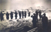 These were two soldiers that were caught in an avalanche at Attu. They were being buried at Little Falls Cemetery at Massacre Bay.  [Vince Kotouch]