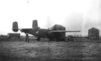 This shows how the planes were worked on at that time. A building large enough to get the wings of a B-24 in to work on was under construction as we left Umnak for Adak.   [Don Blumenthal]