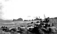  8. Ship Rock from shore, Umnak, 1942-43.  [Sam Shout]