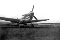 11. A Canadian P-40 (Kittyhawk) on Umnak, 1942-43. RCAF's 14th and 111th Squadrons rotated between performing anti-submarine/convoy escort duty from Kodiak and front-line combat duty at Amchitka. [Sam Shout]