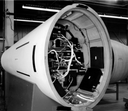[62938: 8/12/1959]  Re-entry vehicle, using wooden boxes to similate actual components. Heavily instrumented for re-entry flight. To the right of the re-entry vehicle is an Engine Thrust Chamber.  [CCMD, Ed May]