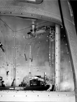 [69864: 12/7/1959]  Looking into another quadrant, empty. Instrument compartment was in an "X" configuration.  [CCMD, Ed May]