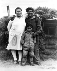 Big Mike Hodikoff, Chief of Native Aleut Tribe On Attu, Wife and Son, 1934. U. S. Navy Photo. [George & Nadine Smith]