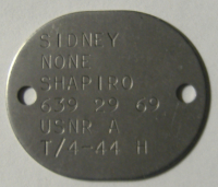 Sidney Shapiro's Dog Tag, Found On Attu, 2008. [Robert Coyle]