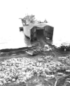 Disgorging equipment & supplies from one of the landing craft. May 1943.  [George Villasenor]