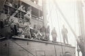 Pre-disembarkation pep talk by commander(s) aboard the transport ship prior to troops landing on Attu at Massacre Bay.  [Ed Nielsen]