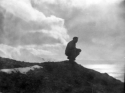 Cloud formations surround Attu, 1945.  [Elbert McBride]