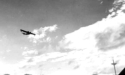 PBY flying overhead. Attu, 1945.  [Elbert McBride]