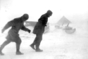 PP and Sam walking in 70-knot winds. The CO ordered us to travel in pairs. Attu, 1945.  [Elbert McBride]