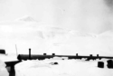 Quonset Huts buried in the snow. Attu, 1945.  [Elbert McBride]