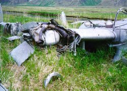 Attu; P-38 Crash Site. Wingtips and props have been removed.  [Philip Nell]