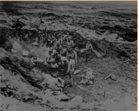 First Jap defenses on Attu fall: troops gather around a field stove, Holtz Bay area, for a hot breakfast, 29 May 1943. [Navy Photo]