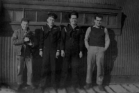 Man's best friend, the mascot "Snowball," poses on the left. [Robert Arnts]