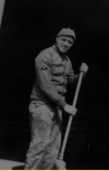 Every GI knows how to handle a broom! Cleaning up the shop!  [Sylvan Weinberger]