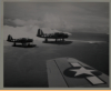 OS2U Observation aircraft, attached to either the USS Trenton or Concord, US Navel Task Force 92, flying over Attu’s Alexai Point.  [George Villasenor]