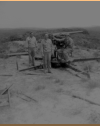 75mm Japanese Gun. Pictured are Ray Vaughn, Norton, and Sjosten.  [Allan Moore]