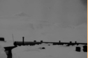Quonset Huts buried in the snow. Attu, 1945.  [Elbert McBride]