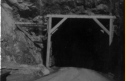 Warehouse tunnel. It goes back into the rock 1/2 mile. Attu, 1945.  {Elbert McBride]