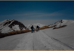 On the road to Engineer Hill. Portions of the road were snow covered, the bikes had to be pushed.  [Russ Marvin]