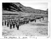 Ken's platoon; 149th Infantry, 7th Division. Attu. Ken shown as a flag bearer.  [Kenneth Rothwell]