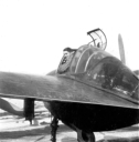 Al getting his picture taken in a P-38.  [Al Gloeckler]