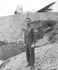 Unknown Individual, B-24 "The Glutton" In The Background. [Owen Harvey]