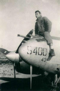 Tony Suarez Sitting Astride A P-38 Lightning. [Tony Suarez]