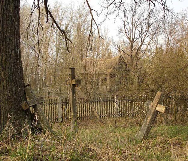 Hasty scratches on wooden crosses...